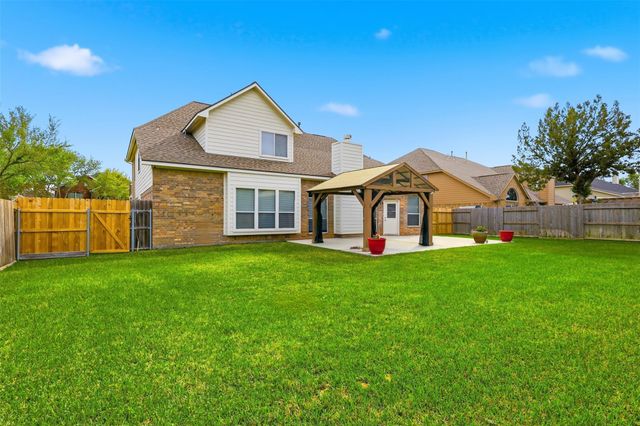 17406 N Riata Lake Drive, Cypress, TX 77433