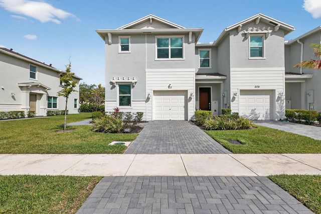 211 SE Woodbark Street, Port St. Lucie, FL 34984