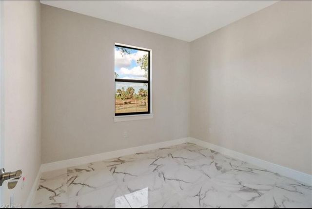 2436 14th AVE NE, Naples, FL 34120