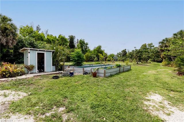 7697 Beach Daisy LN, Bokeelia, FL 33922