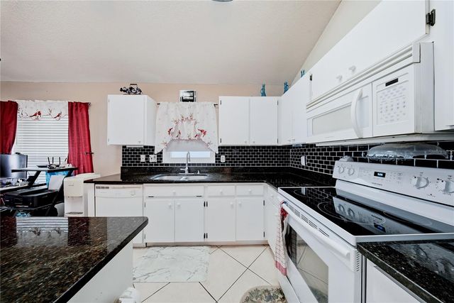 6804 MIRROR LAKE AVENUE, Tampa, FL 33634