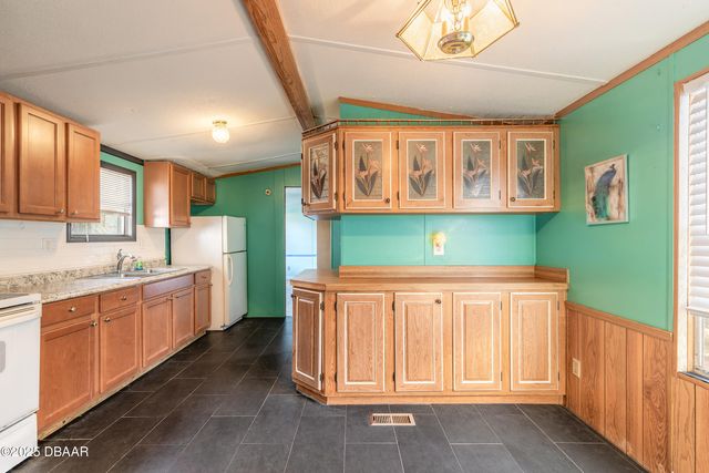 1051 Green Acres Circle N, South Daytona, FL 32119