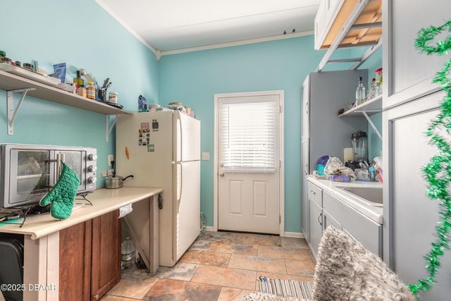 1051 Green Acres Circle N, South Daytona, FL 32119