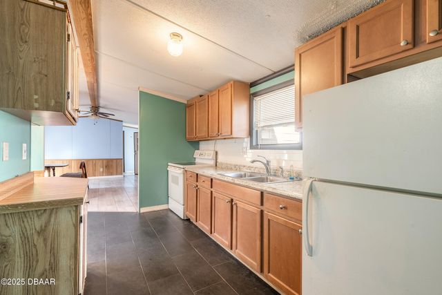 1051 Green Acres Circle N, South Daytona, FL 32119