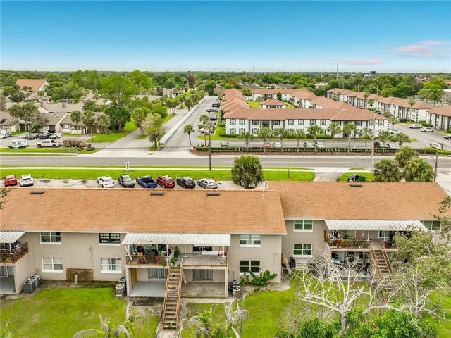 5885 DAHLIA DRIVE 103, Orlando, FL 32807