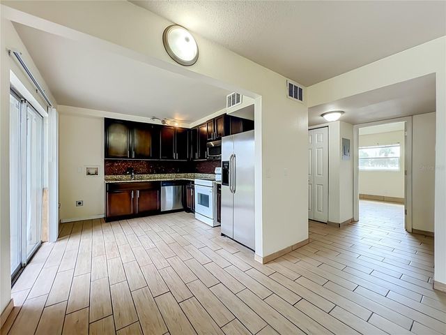 5885 DAHLIA DRIVE 103, Orlando, FL 32807