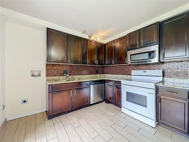 5885 DAHLIA DRIVE 103, Orlando, FL 32807