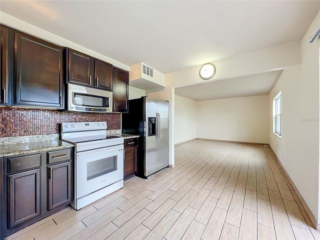 5885 DAHLIA DRIVE 103, Orlando, FL 32807