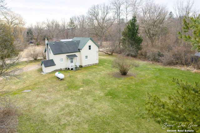 5856 Kiddville Road, Orleans Twp, MI 48809