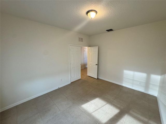 12093 STONE BARK TRAIL, Orlando, FL 32824