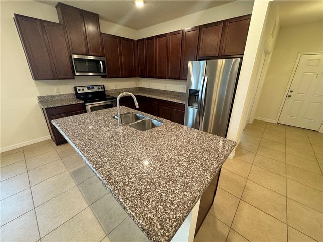 12093 STONE BARK TRAIL, Orlando, FL 32824