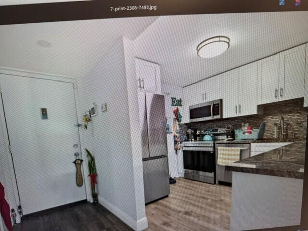 Image 5 of property listing at 2308 S Cypress Bend Drive #123, Pompano Beach, FL 33069