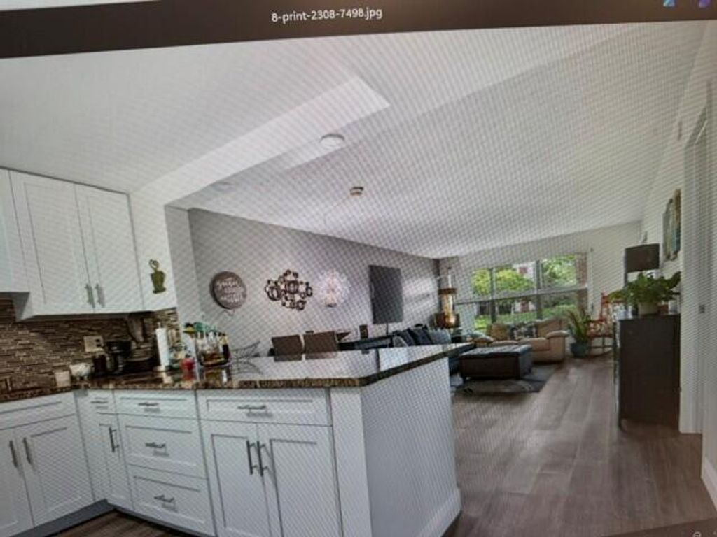 Image 6 of property listing at 2308 S Cypress Bend Drive #123, Pompano Beach, FL 33069