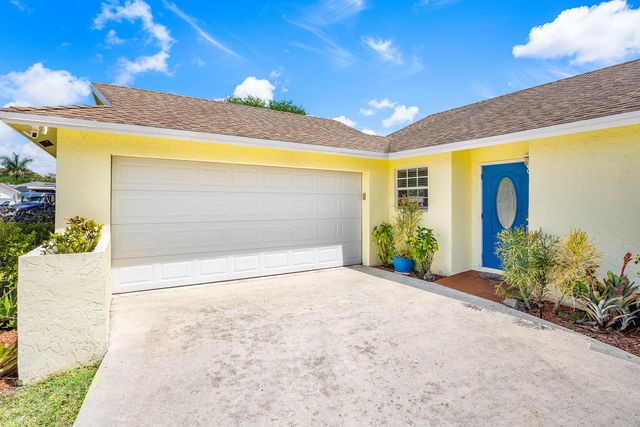 246 Natchez Court, Royal Palm Beach, FL 33411