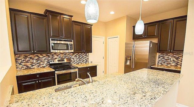 1652 PLUMERIA PLACE, Oviedo, FL 32765