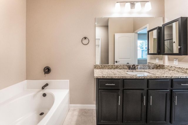 7615 Square Garden Lane, Conroe, TX 77304