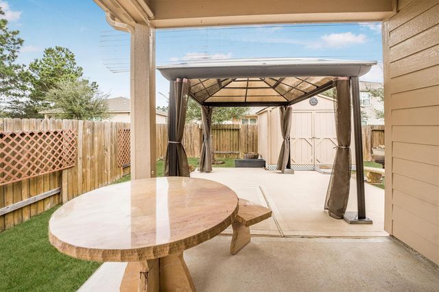 7615 Square Garden Lane, Conroe, TX 77304