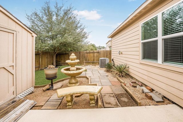 7615 Square Garden Lane, Conroe, TX 77304