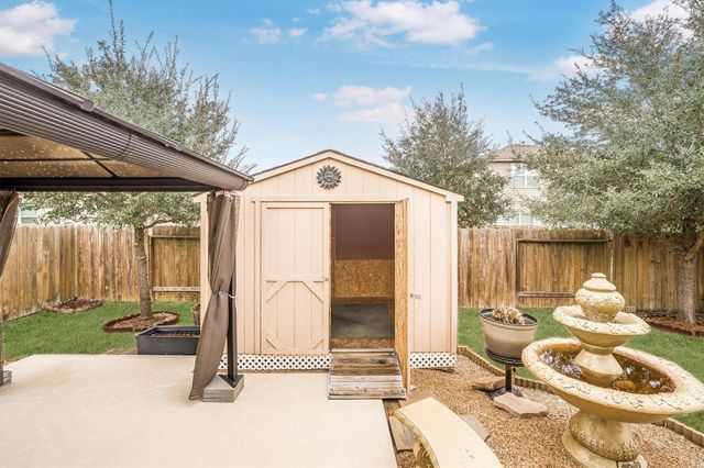 7615 Square Garden Lane, Conroe, TX 77304