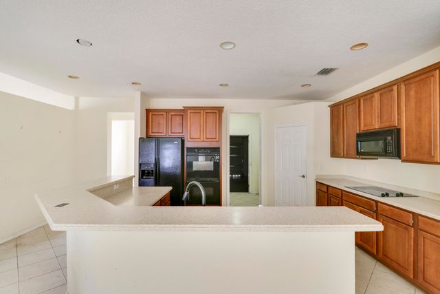 1599 Newhaven Point Lane, West Palm Beach, FL 33411