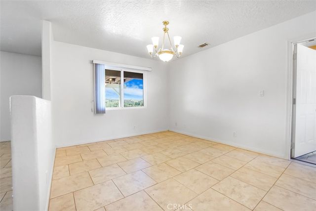 11221 Omelveny Road, Oak Hills, CA 92344