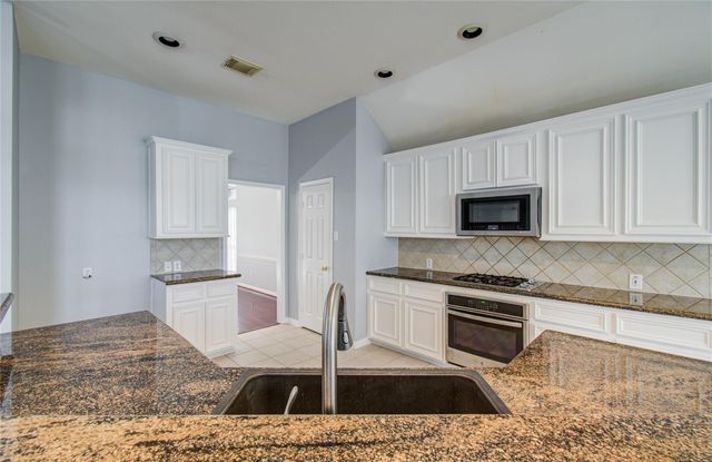 14731 Raven Hollow Lane, Humble, TX 77396