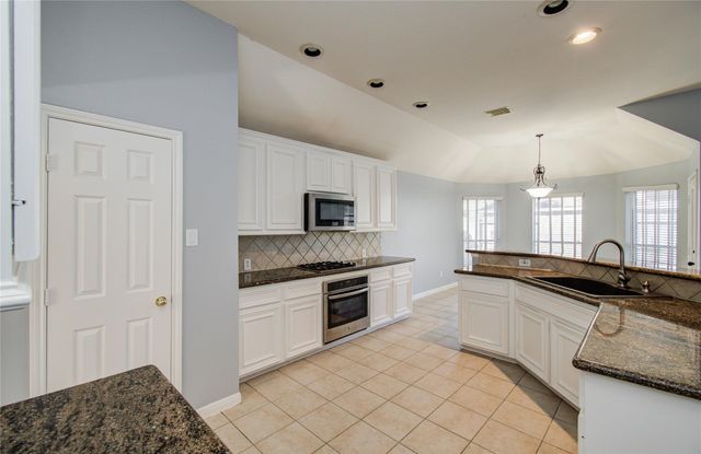 14731 Raven Hollow Lane, Humble, TX 77396