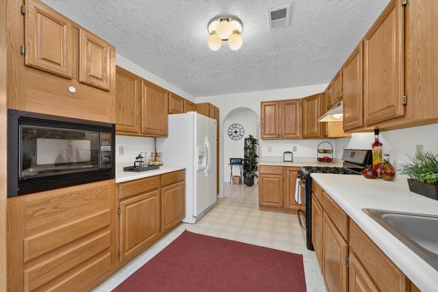 7221 Sunlight Peak Drive NE, Rio Rancho, NM 87144