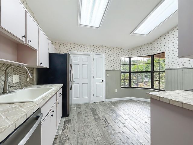 12208 WEDGEFIELD DRIVE, Grand Island, FL 32735