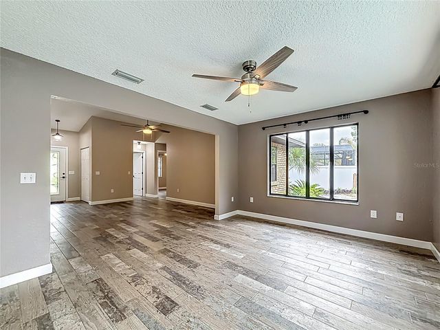 12208 WEDGEFIELD DRIVE, Grand Island, FL 32735
