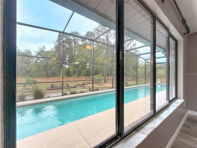 12208 WEDGEFIELD DRIVE, Grand Island, FL 32735