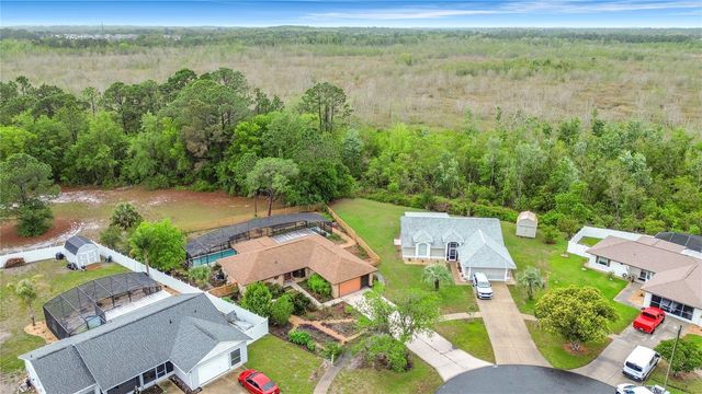 12208 WEDGEFIELD DRIVE, Grand Island, FL 32735