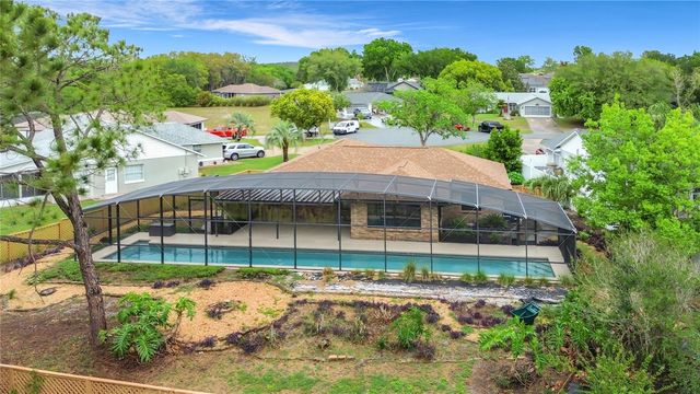 12208 WEDGEFIELD DRIVE, Grand Island, FL 32735
