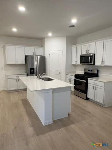 417 Lake Sweetwater Lane, Buda, TX 78610