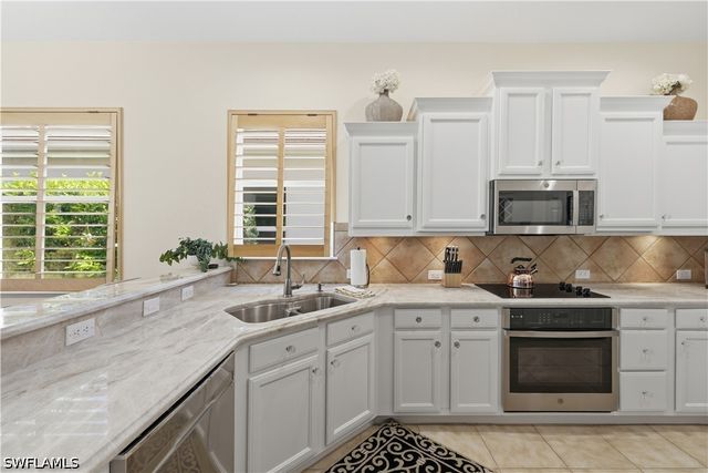 9235 Troon Lakes DR, Naples, FL 34109