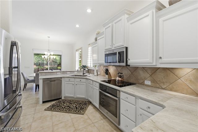 9235 Troon Lakes DR, Naples, FL 34109