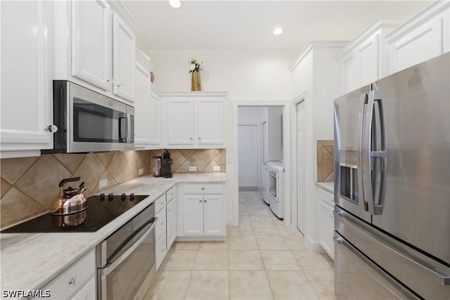 9235 Troon Lakes DR, Naples, FL 34109