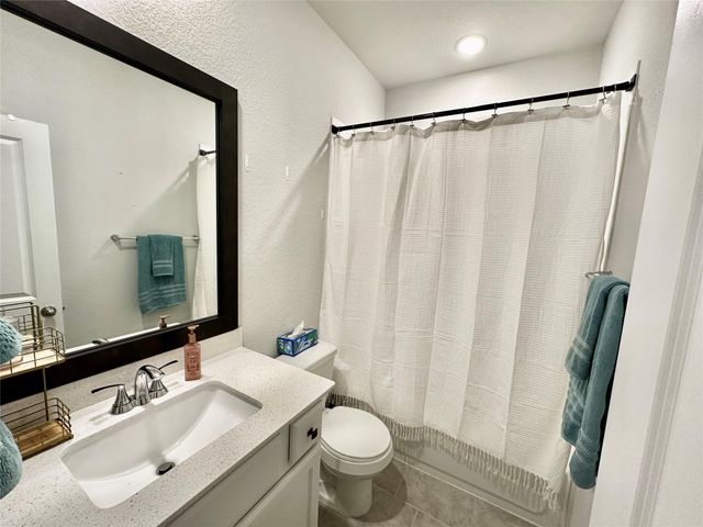 420 Flowering Lotus Court, Willis, TX 77318