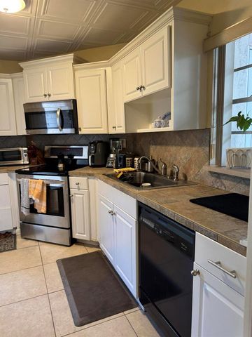 7 N Greenway Vlg Village N 107, Royal Palm Beach, FL 33411
