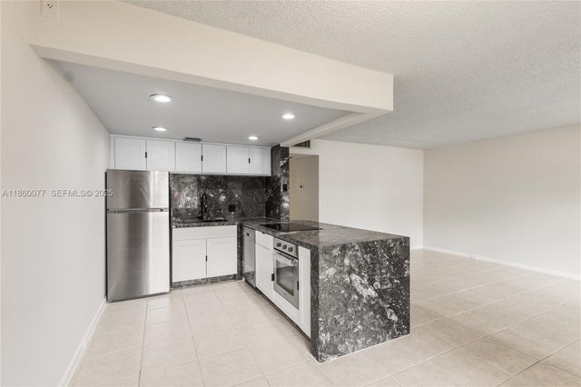 251 SW 132 Way 114H, Pembroke Pines, FL 33027