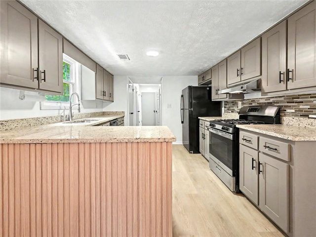 7156 Whitfield Drive, Riverdale, GA 30296