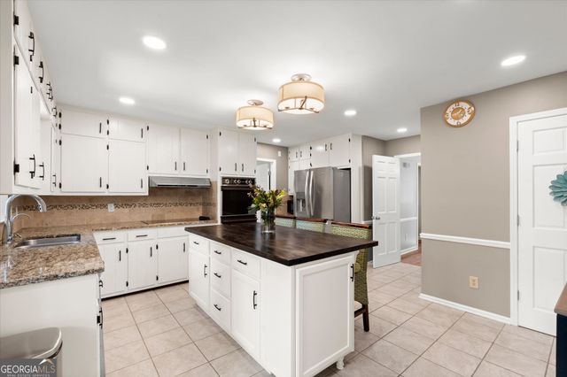 4977 Kings Wood Drive NE, Roswell, GA 30075