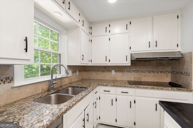 4977 Kings Wood Drive NE, Roswell, GA 30075