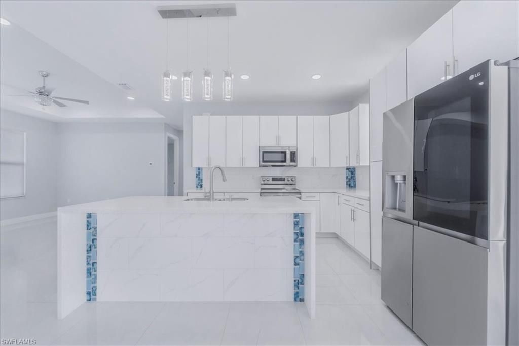 Image 10 of property listing at 1114 NE 7th AVE, Cape Coral, FL 33909