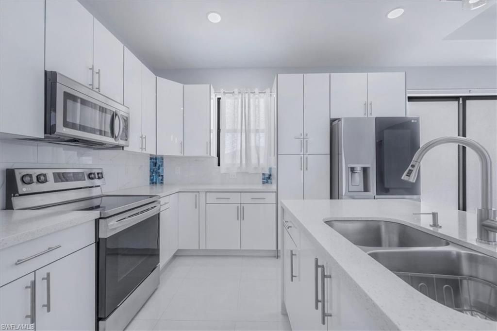 Image 8 of property listing at 1114 NE 7th AVE, Cape Coral, FL 33909