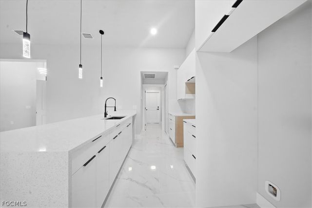 2715 27th ST SW, Lehigh Acres, FL 33976