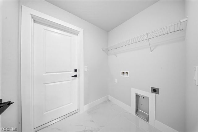 2715 27th ST SW, Lehigh Acres, FL 33976