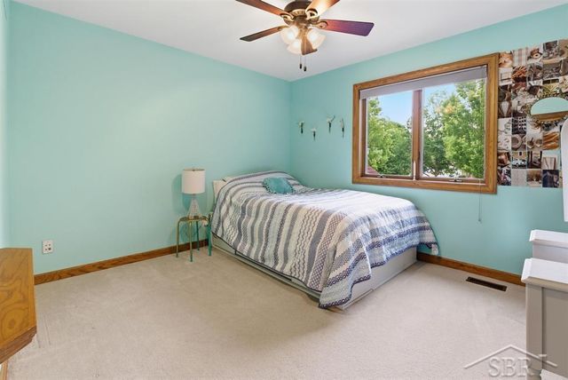 6102 Oak Meadows Court, Midland, MI 48640