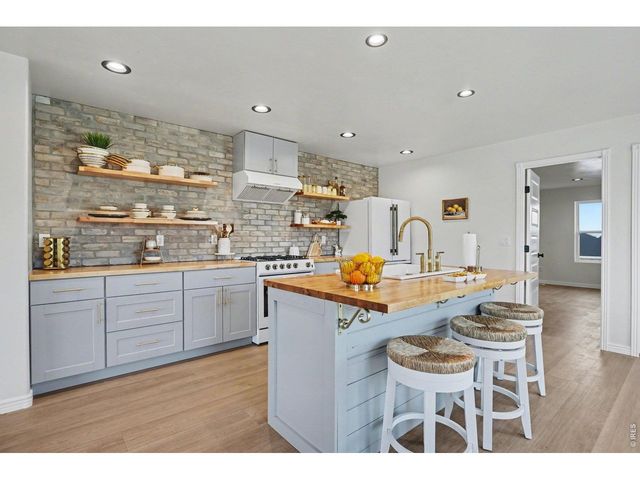 125 6th St, Dacono, CO 80514
