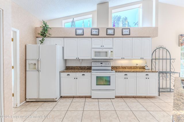 2075 Quailwood Lane, Spring Hill, FL 34606